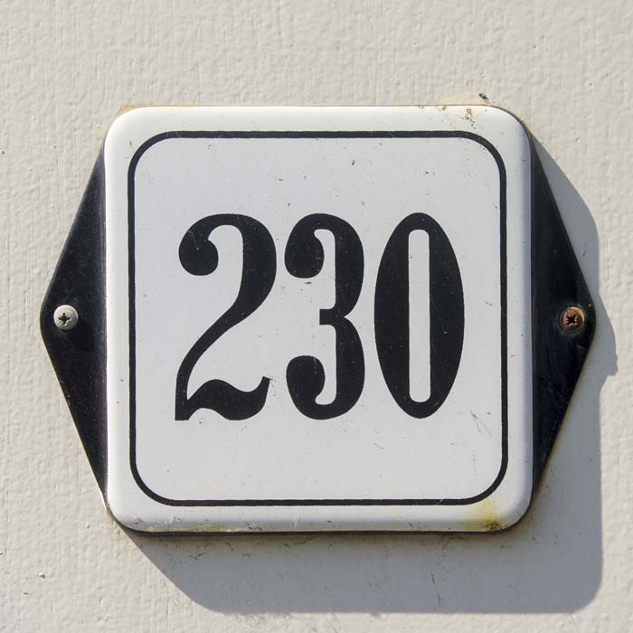 Plaque with 230 on it