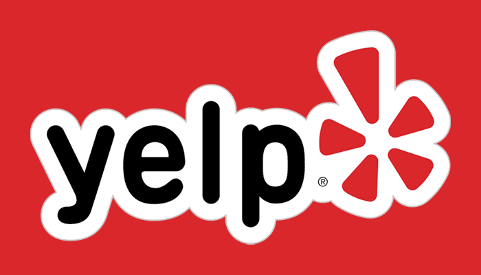 Yelp Logo - Black sans-serif lowercase type with red starburst to right with white outline on red background