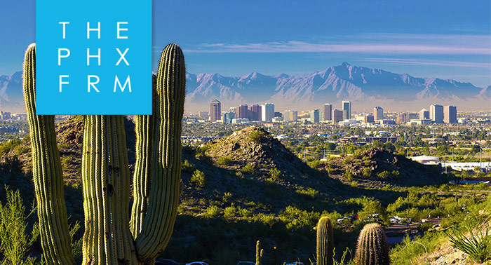 Phoenix Forum logo over image of desert