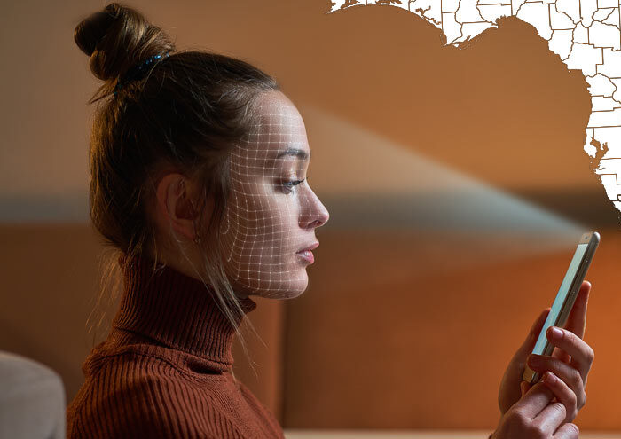 Photo of a woman looking at a phone with white map of Florida in upper right corner