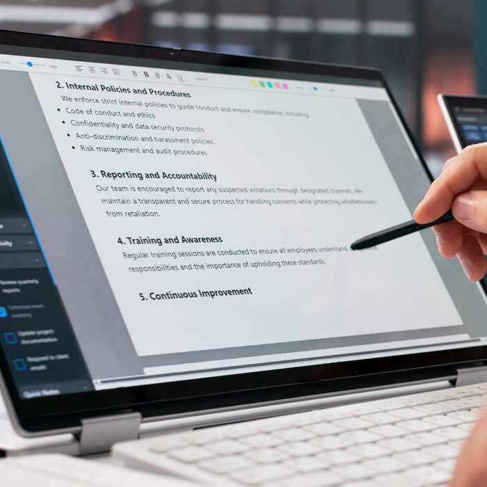 Photo of a person reviewing internal online policies