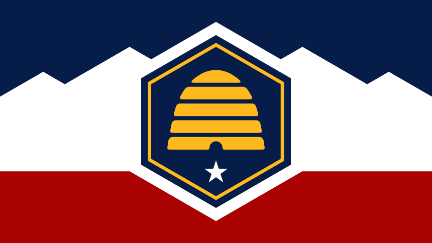 Utah state flag showing bee hive in center with dark blue above and red below